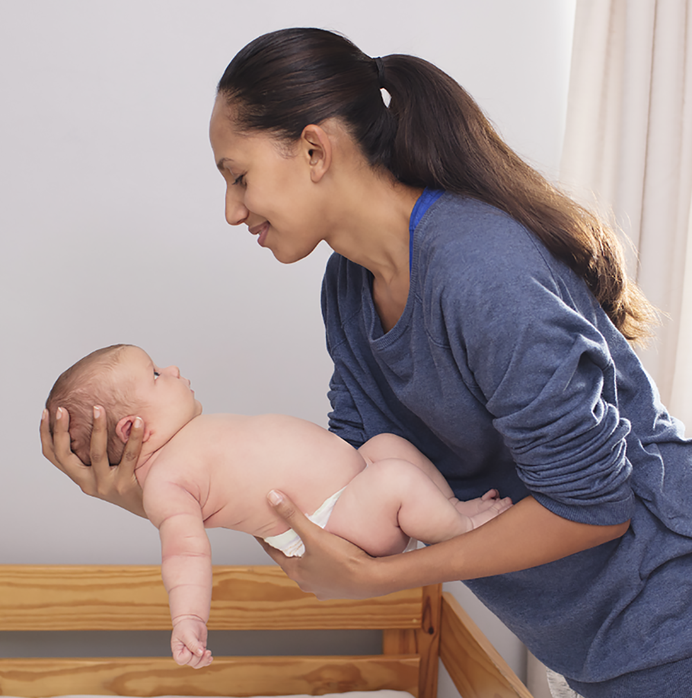 New mum holding her baby